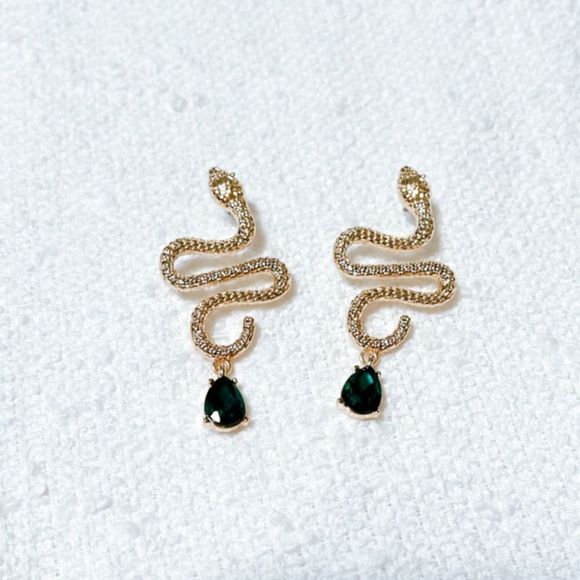 Free People Jewelry - Gold snake earrings M238